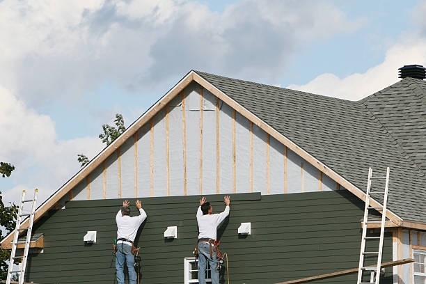 Professional Siding Replacement technician working in Richwood, TX